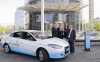 Renault Fluence Z.E. obok terminalu ładowania RWE